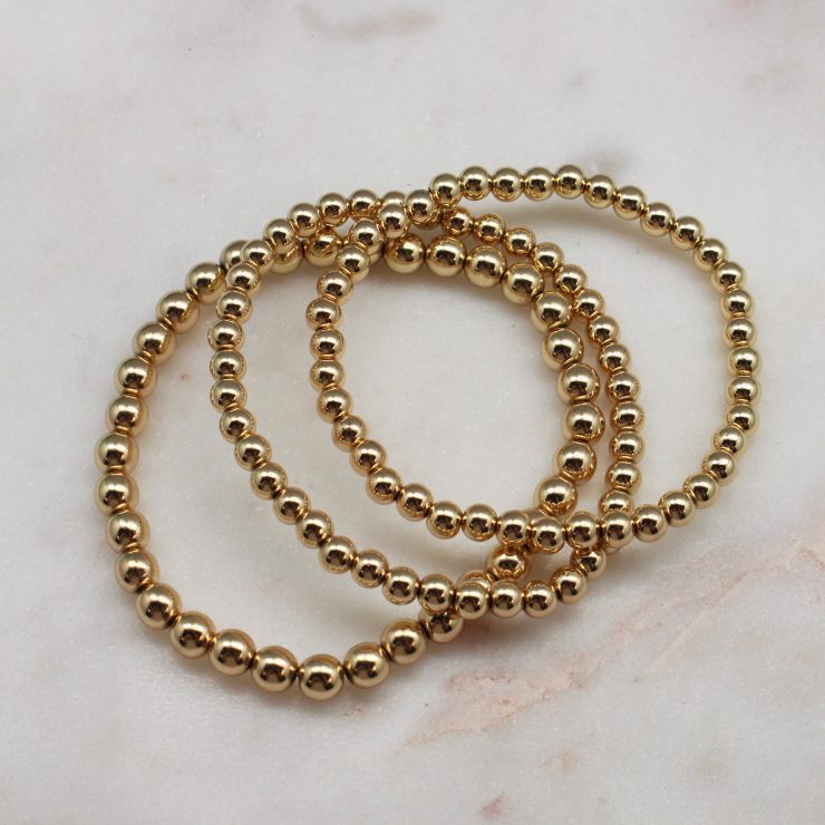A photo of the Gold Beaded Bracelet Set Of 3 product
