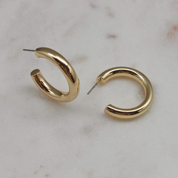 A photo of the Classic Gold Hoops product