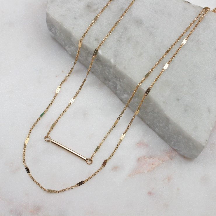 A photo of the Delicate Layers Necklace In Gold product