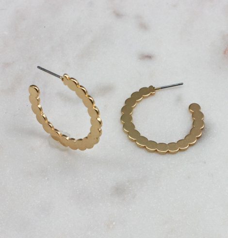 A photo of the Dotted Gold Hoops product