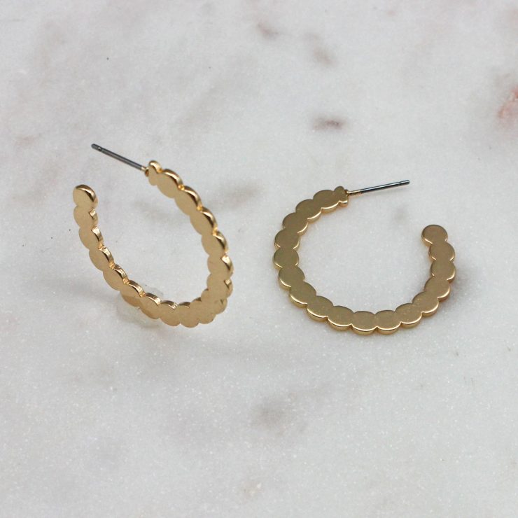 A photo of the Dotted Gold Hoops product