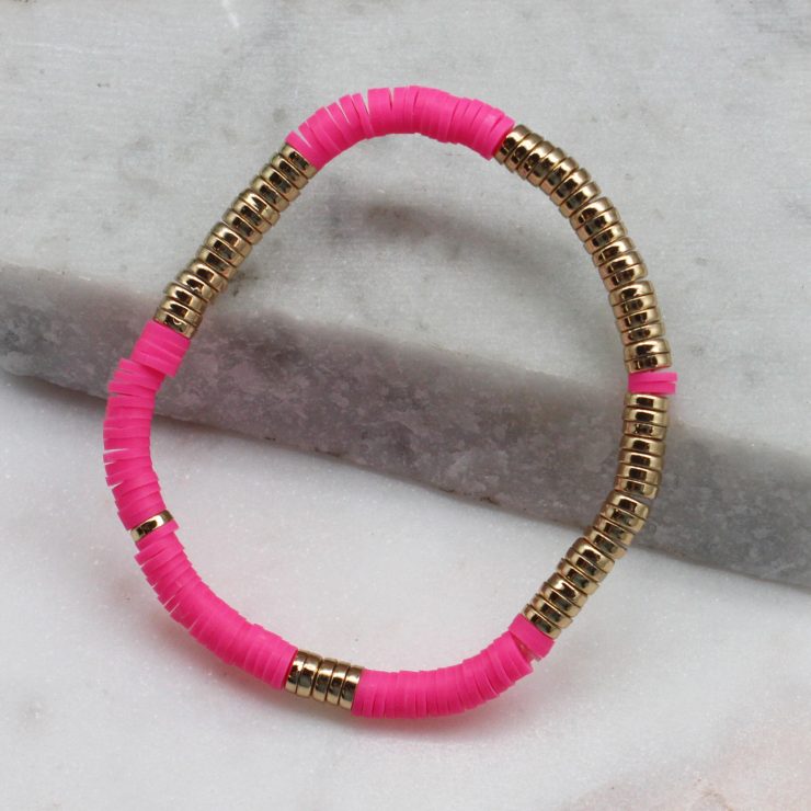 A photo of the Pink & Gold Beaded Bracelet product