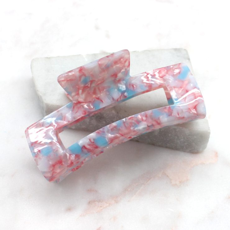 A photo of the Lola Jaw Clip In Pink & Blue product