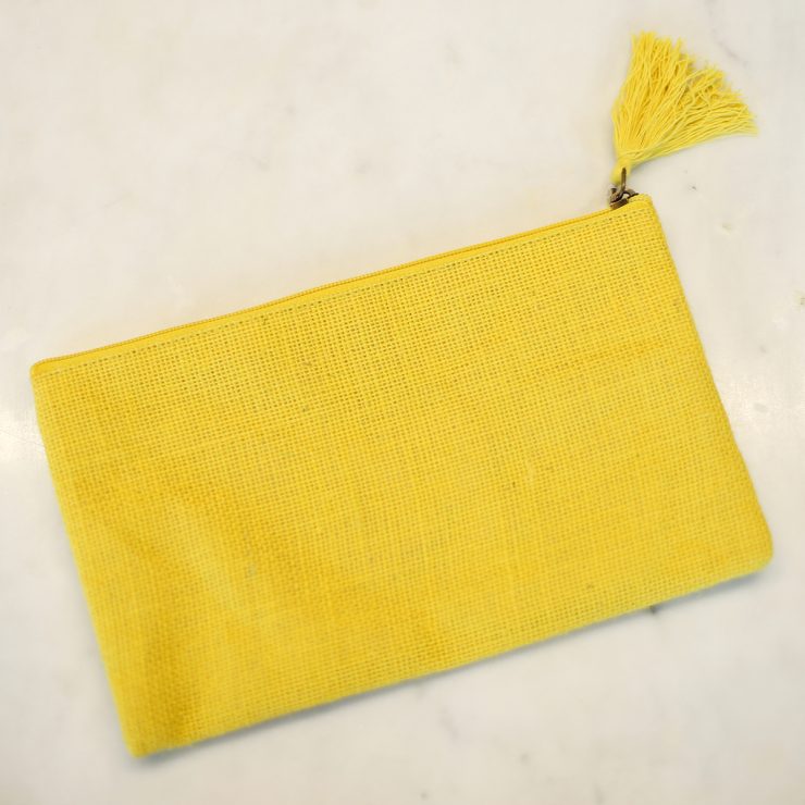 A photo of the Jute Cosmetic Bag In Yellow product