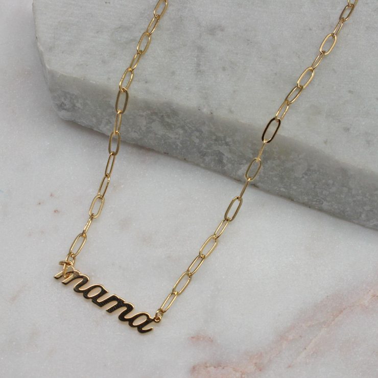 A photo of the Mama Paper Clip Necklace In Gold product