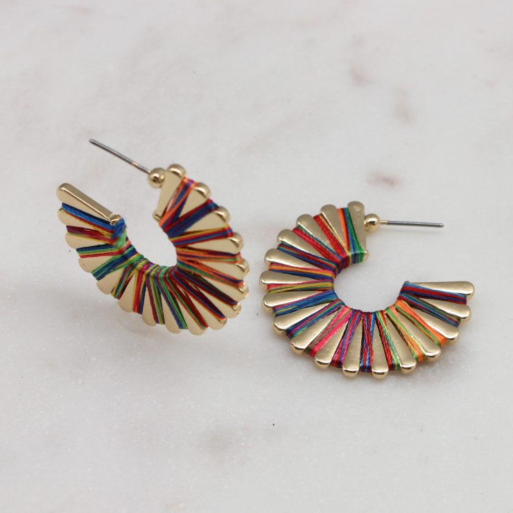 A photo of the Wound Up Earrings In Multi product