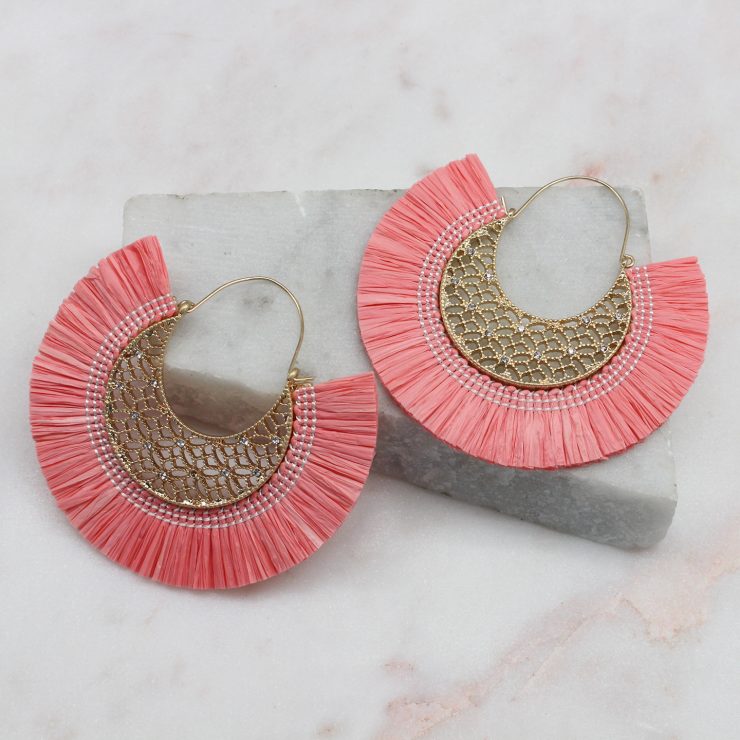 A photo of the Summer Breeze Earrings In Pink product