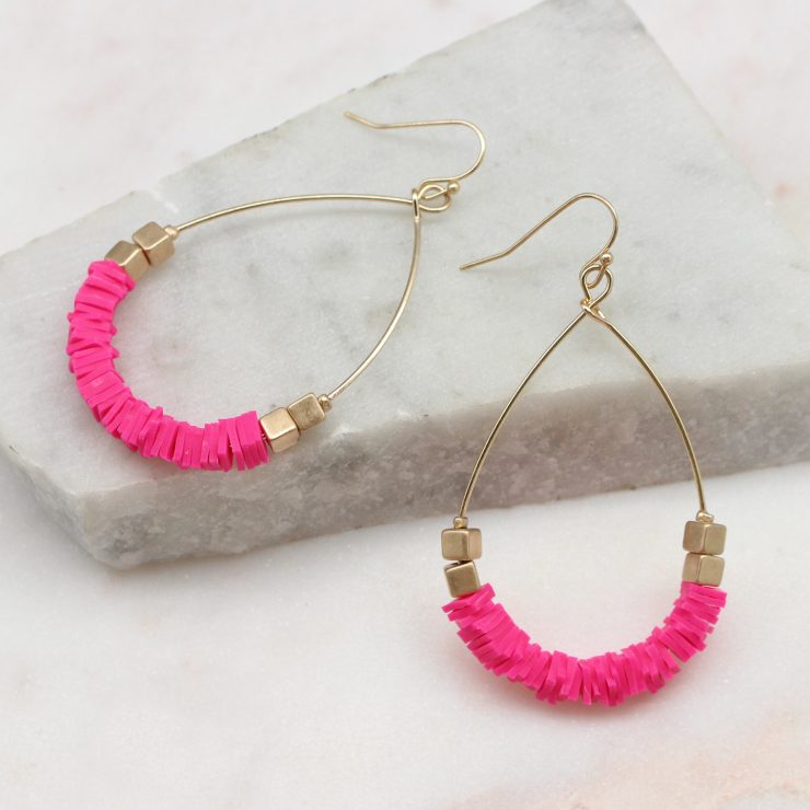 A photo of the Summertime Earrings In Pink product