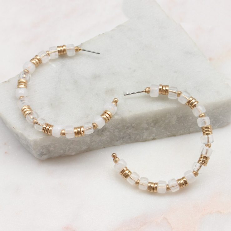 A photo of the Trina Beaded Hoops In White product