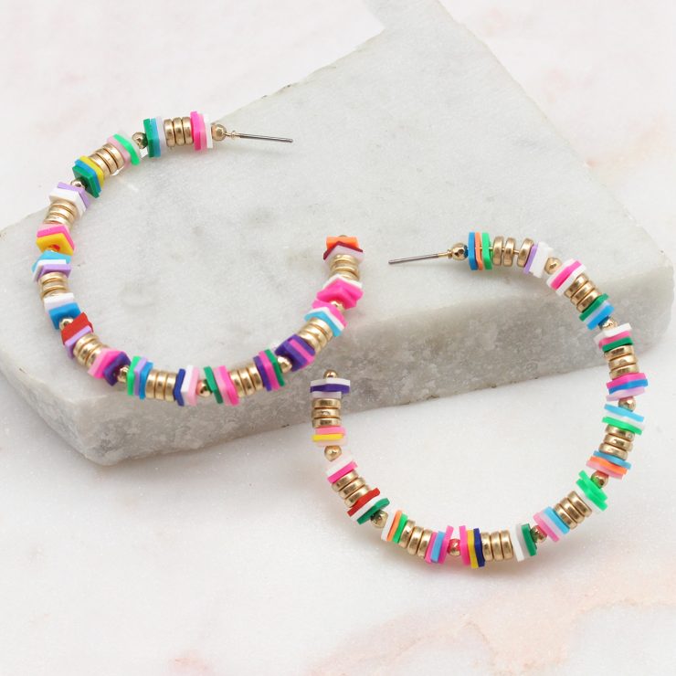 A photo of the Willow Hoop Earrings product