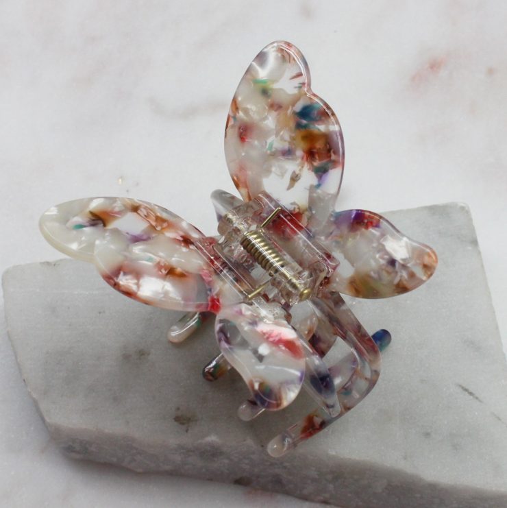 A photo of the Multi Colored Butterfly Clip product