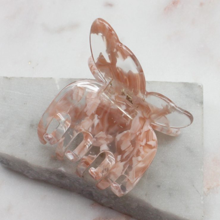 A photo of the Pink & Clear Butterfly Clip product