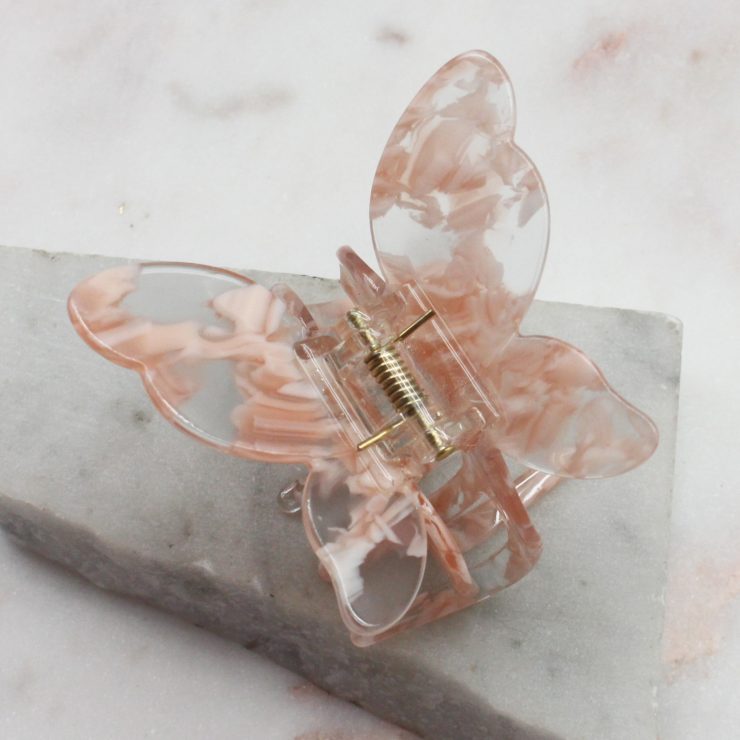 A photo of the Pink & Clear Butterfly Clip product