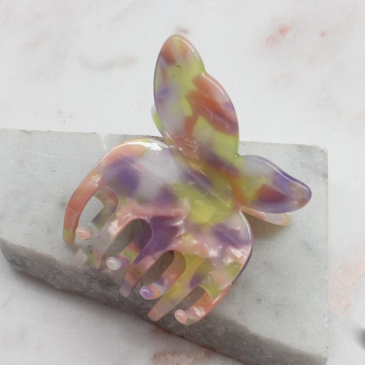 A photo of the Pink, Purple & Yellow Butterfly Clip product