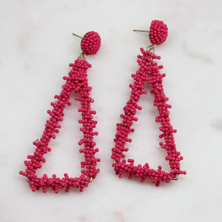 A photo of the Lana Beaded Earrings In Pink product