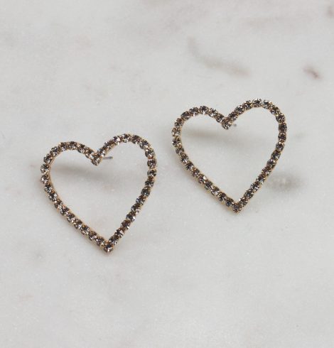 A photo of the Rhinestone Heart Earrings In Gold product
