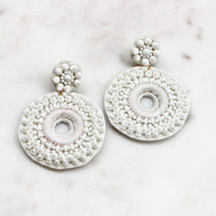 A photo of the Round About Beaded Earrings product