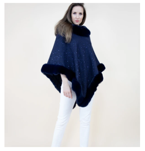 A photo of the Sequin Crochet Poncho With Faux Fur Trim product