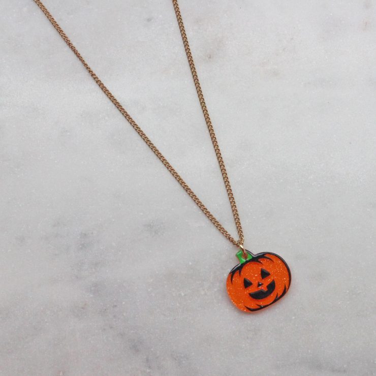 A photo of the Jack-O-Lantern Necklace product