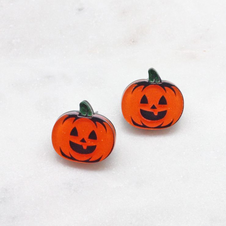 A photo of the Jack-o-Lantern Stud Earrings product