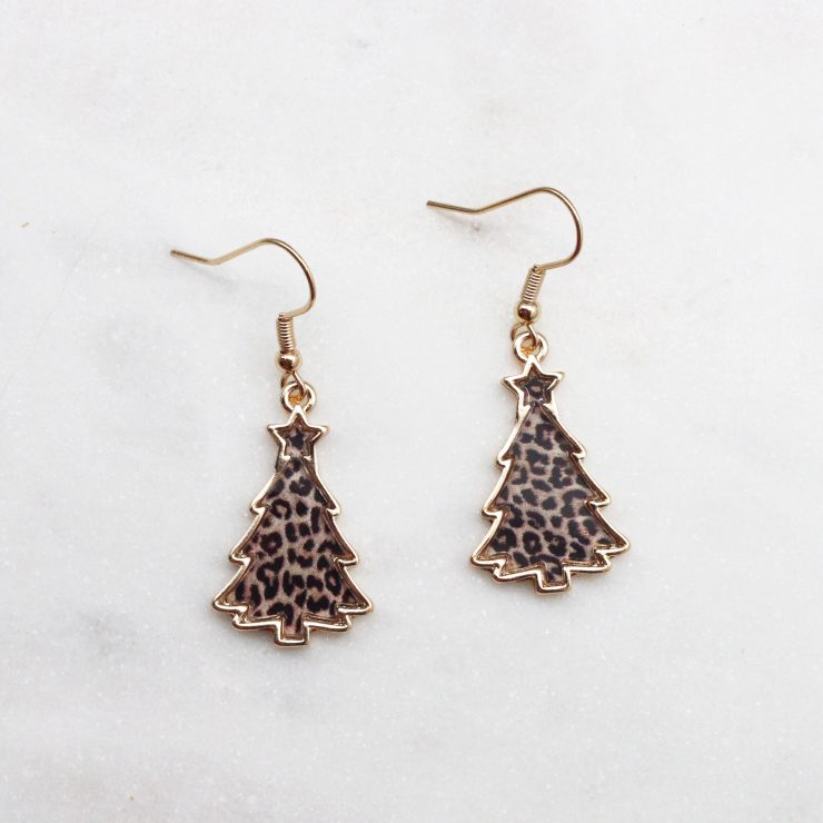 A photo of the Leopard Christmas Tree Earrings product