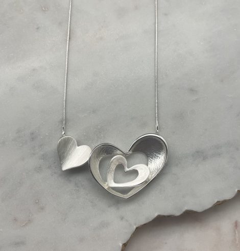 A photo of the Full Of Hearts Necklace product
