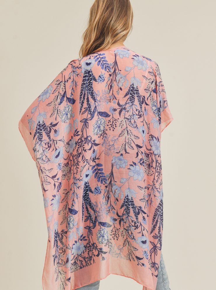 A photo of the Floral Kimono In Coral product