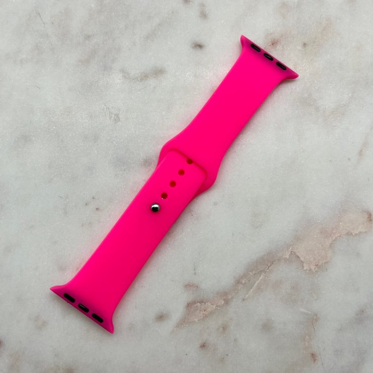 A photo of the Neon Pink Apple Watch Band product
