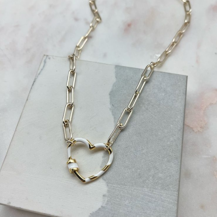 A photo of the Open Hearts Paper Clip Necklace product