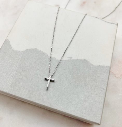 A photo of the Simple Cross Necklace In Silver product