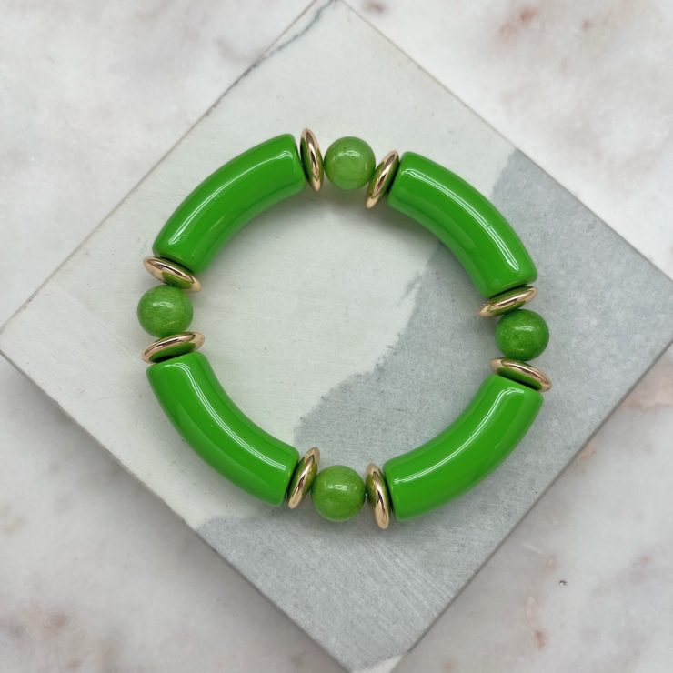 A photo of the Tube Stretch Bracelet In Green product