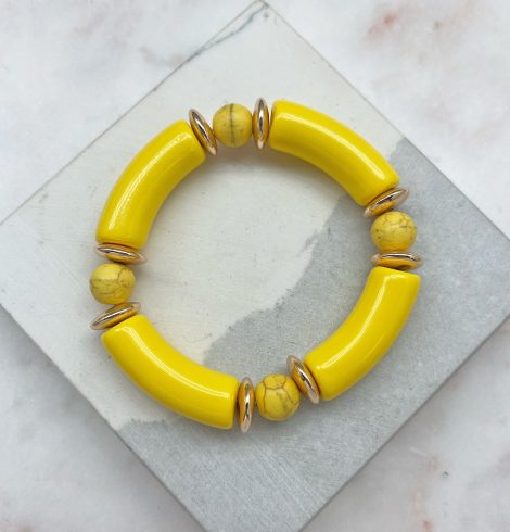 A photo of the Tube Stretch Bracelet In Yellow product