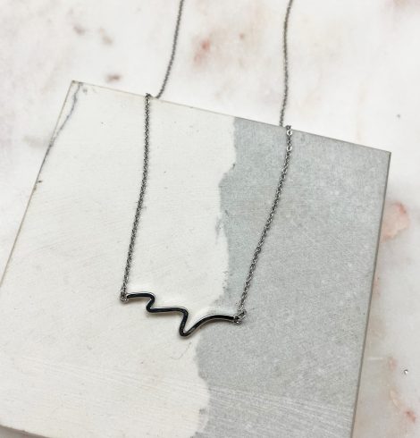 A photo of the Wave Necklace In Silver product