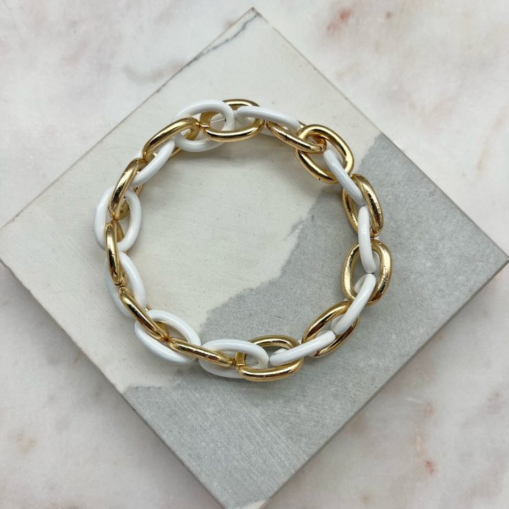 A photo of the White & Gold Link Stretch Bracelet product