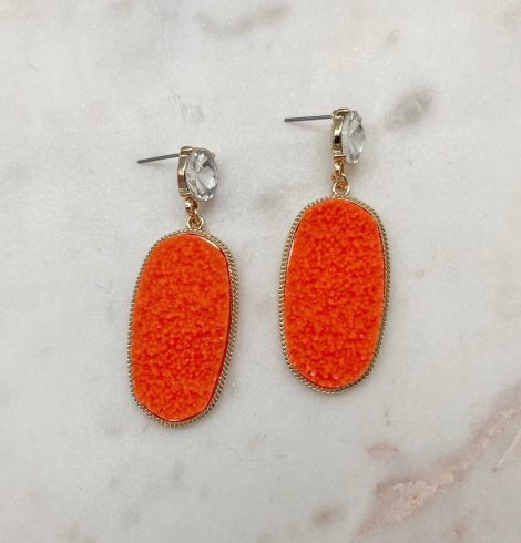 A photo of the Camille Earrings In Orange product