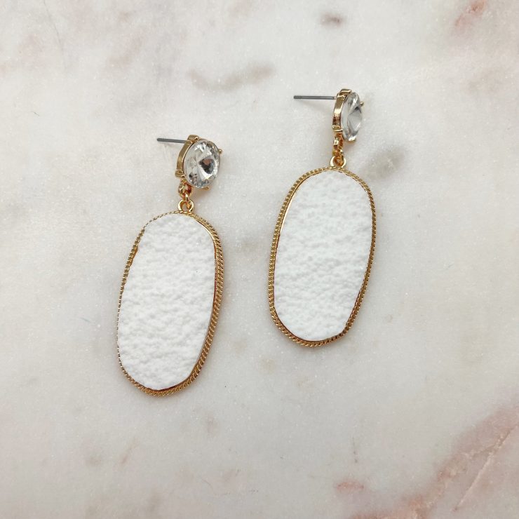 A photo of the Camille Earrings In White product