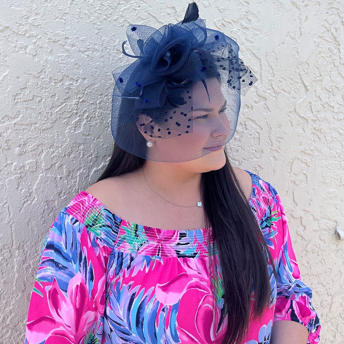 A photo of the Rose Fascinator In Navy product