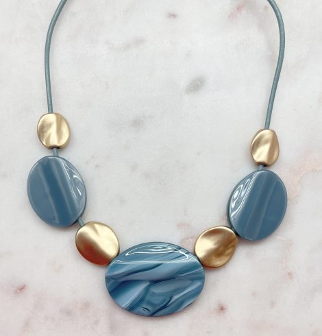 A photo of the Pebble Necklace In Blue product