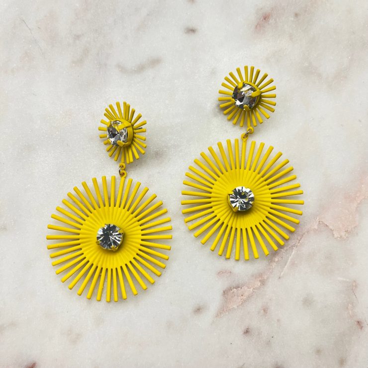 A photo of the Starburst Earrings In Yellow product