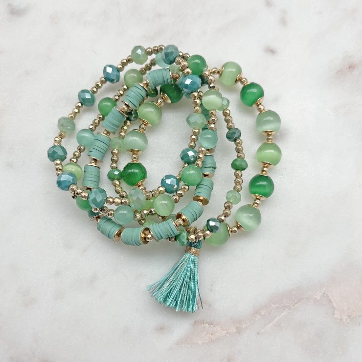 A photo of the Beaded Bracelet Stack In Green product