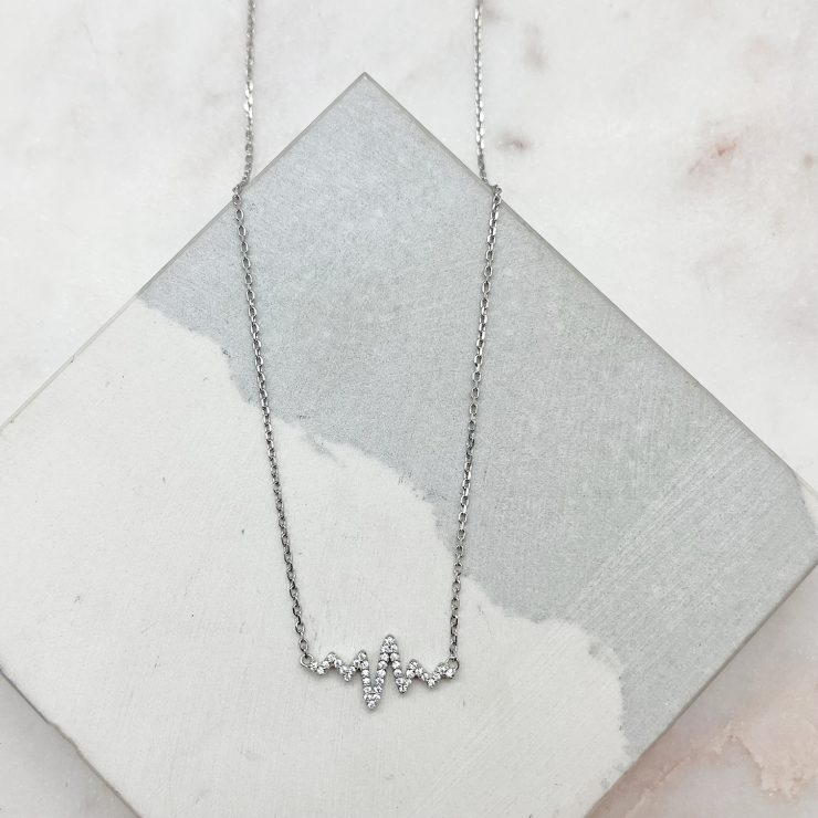 A photo of the Racing Heart Necklace product