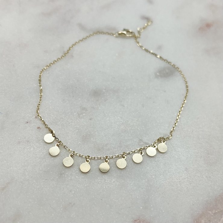 A photo of the Sterling Silver Gold Tone Round Discs Anklet product