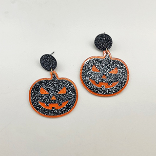 A photo of the Glitter Jack-O-Lantern Earrings In Black product