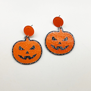 A photo of the Glitter Jack-O-Lantern Earrings In Orange product