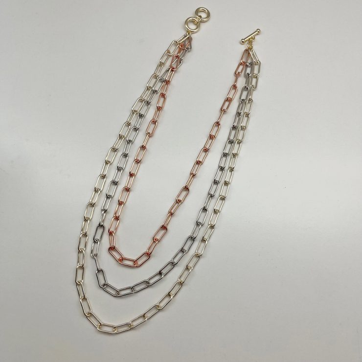 A photo of the Tri Colored Paper Clip Necklace product