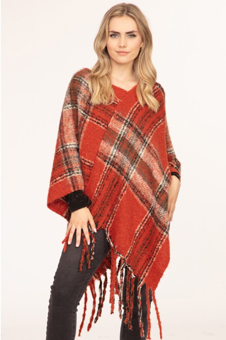 A photo of the Multi Color Plaid Poncho In Clay product