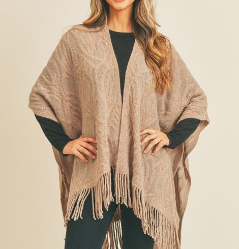 A photo of the Embossed Pattern Fringe Ruana In Taupe product