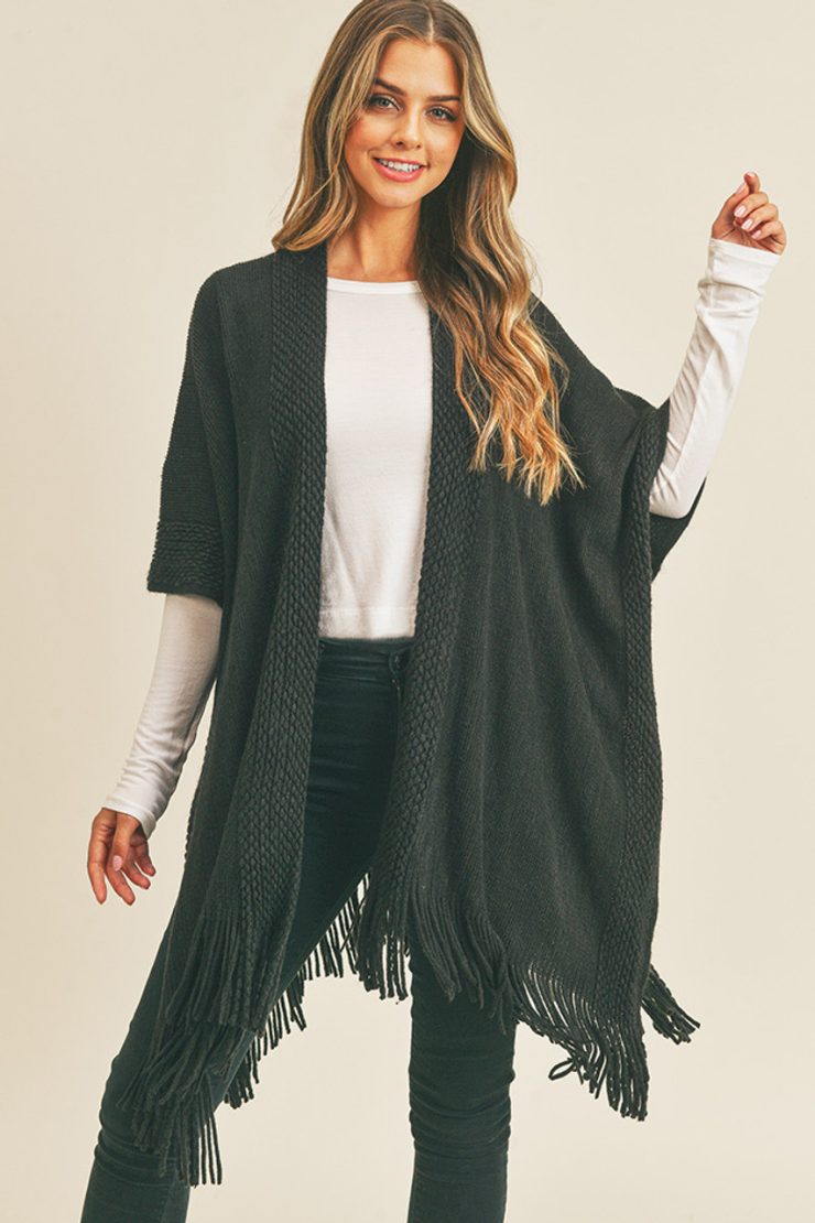 A photo of the Trim Detail Fringe Kimono In Black product