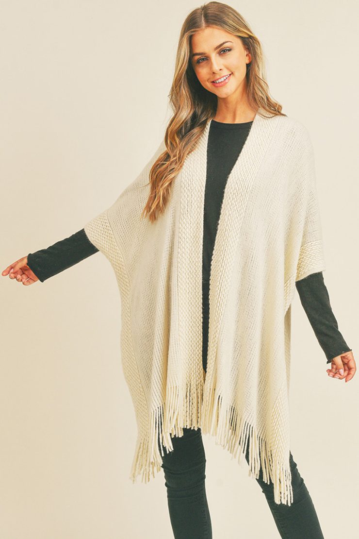 A photo of the Trim Detail Fringe Kimono In Ivory product