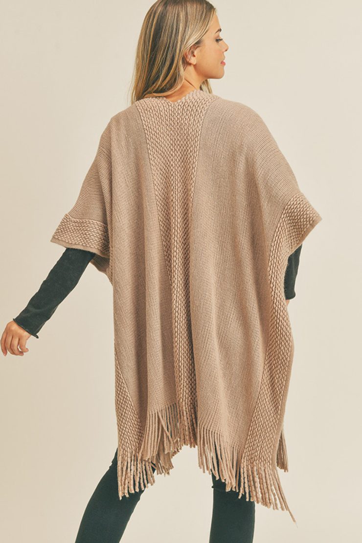 A photo of the Trim Detail Fringe Kimono In Taupe product